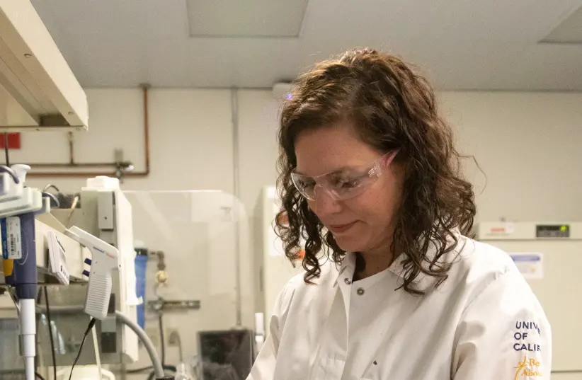 Geneticist Karen Miga is seen at a laboratory, used in research involving the human Y chromosome, at the University of California, in Santa Cruz, California, US, February 10, 2022. (credit: Carolyn Lagattuta, UC Santa Cruz/Handout via REUTERS)